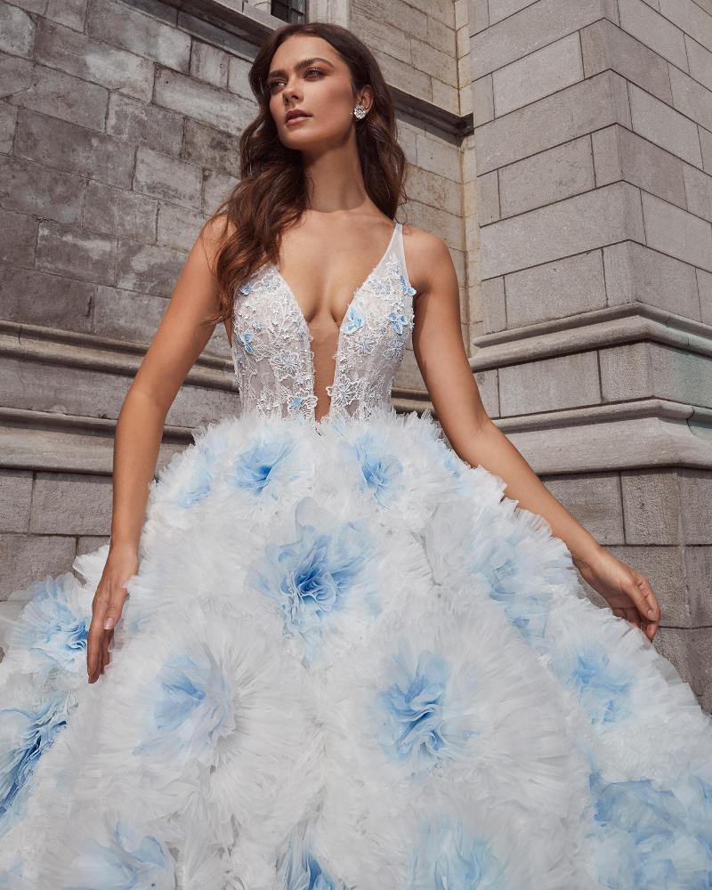 124123 ivory or light blue wedding dress with ball gown silhouette and tank straps3